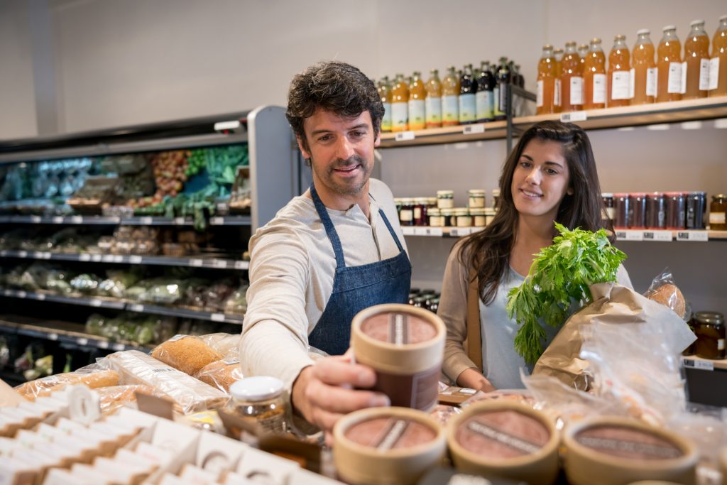 A host support a costumer in a grocery store